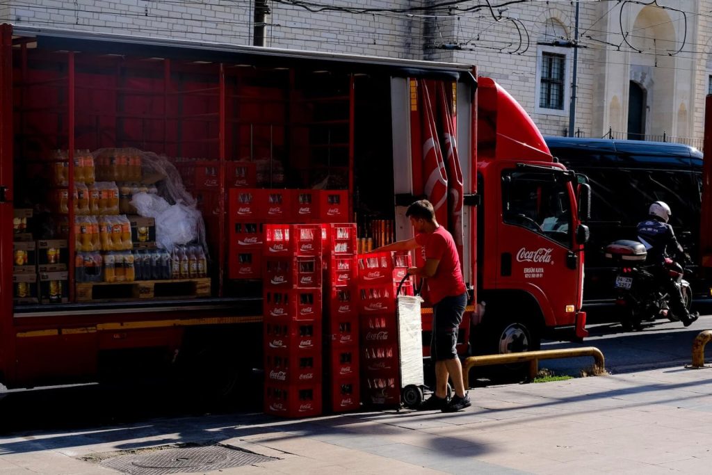 unloading coca cola commercial vehicle
