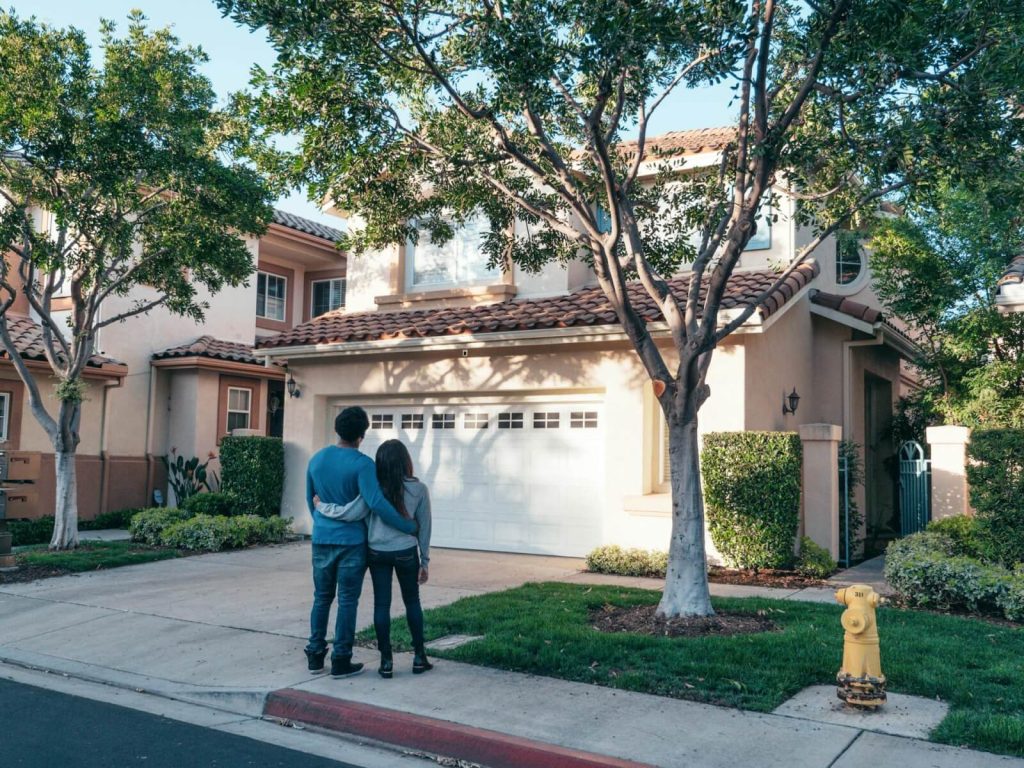 couple admires new Columbus home