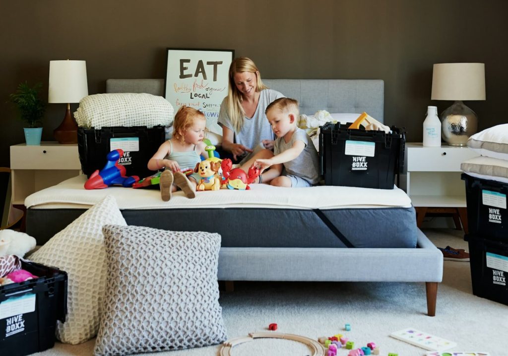 New homeowners and family members unpack in new home in Mount Vernon, Ohio